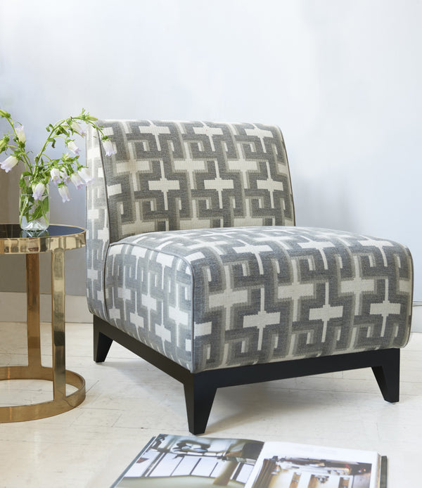 Metro Armless chair with sidetable and book