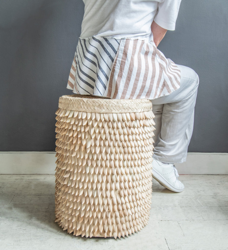 Lady sat on Porcupine Stool