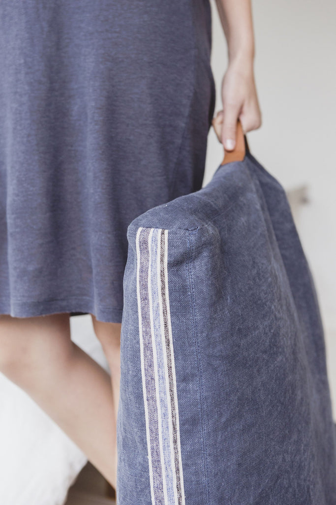 Galloper Floor Cushion Being held by Woman