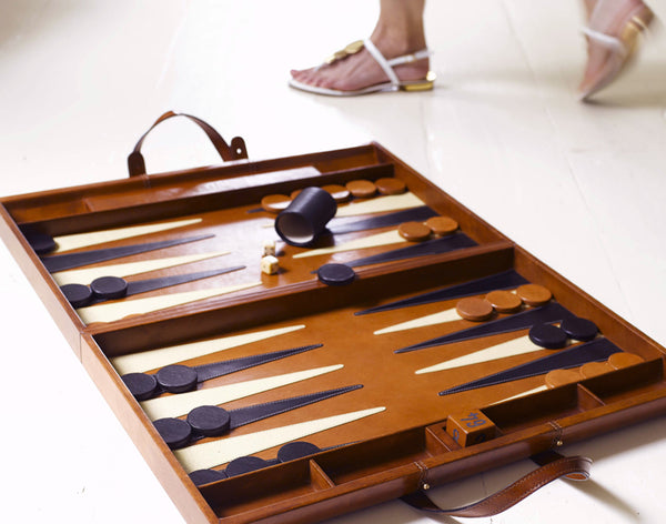 Leather Backgammon Board on floor with feet