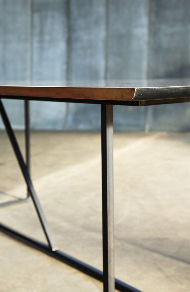 Iron and Brass Dining table shown from side
