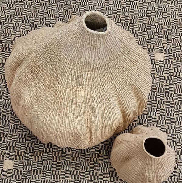 Organic Gourd Baskets on Textured floor