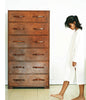 Havana Leather Chest of Drawers with girl walking