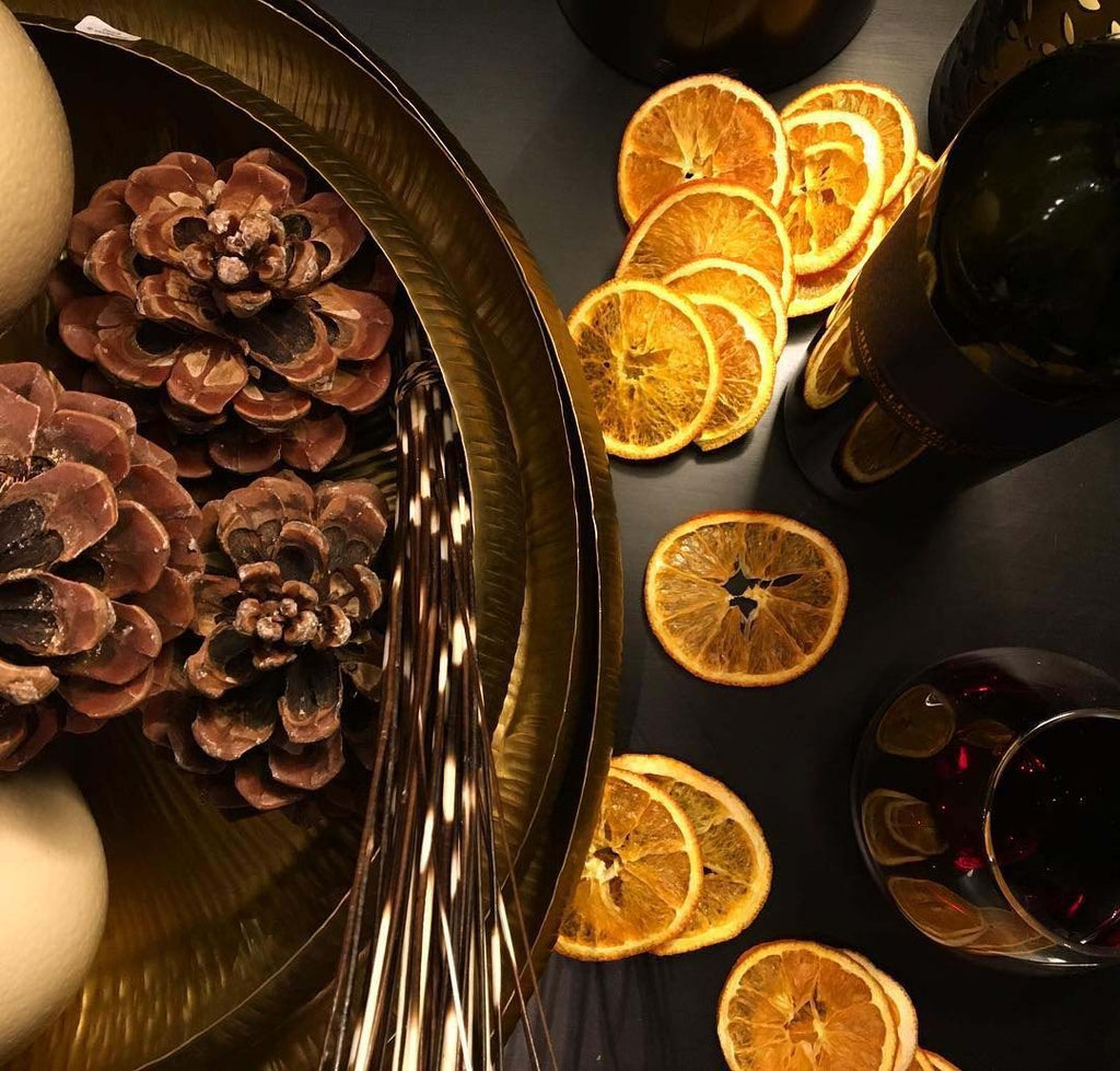 Mandoon Bowls with Pinecones oranges wine and quills
