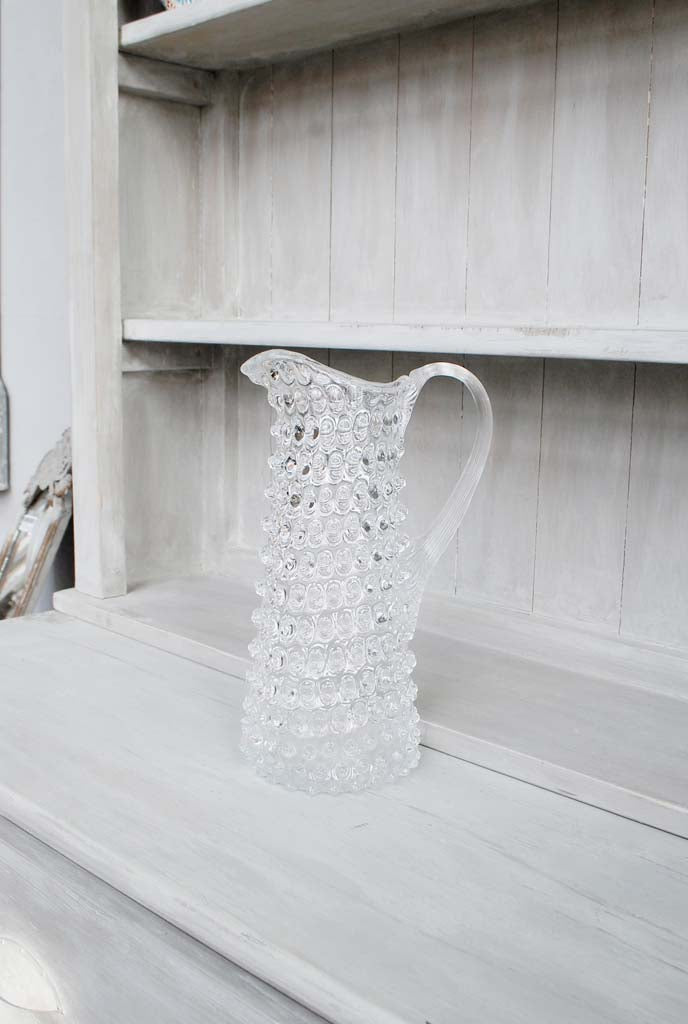 Tall Hobnail Glass Jug with background